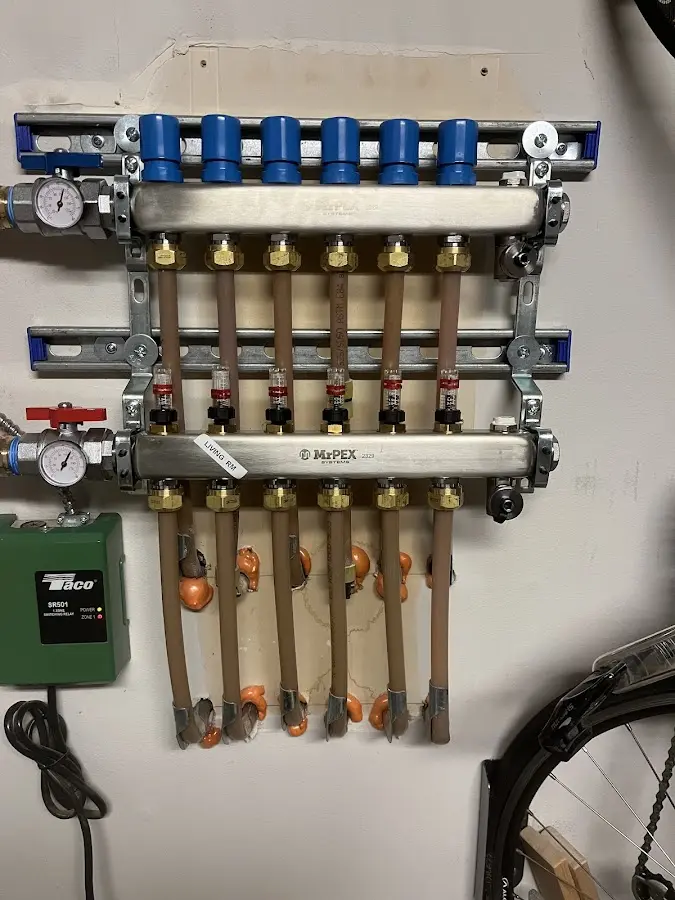 Plumber performing Water Heater Repair at a residential property in Venersborg